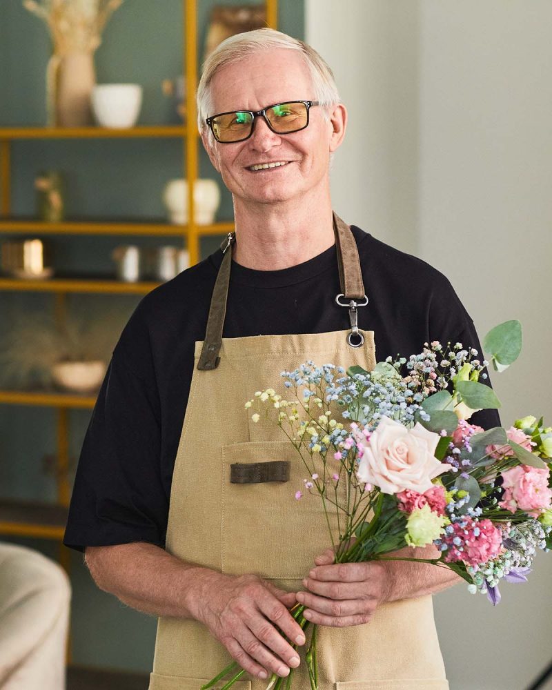 senior-male-florist-smiling-7WWJUTY.jpg
